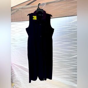 Brown Button Down Sleeveless Dress L. Hangs just below the knees.